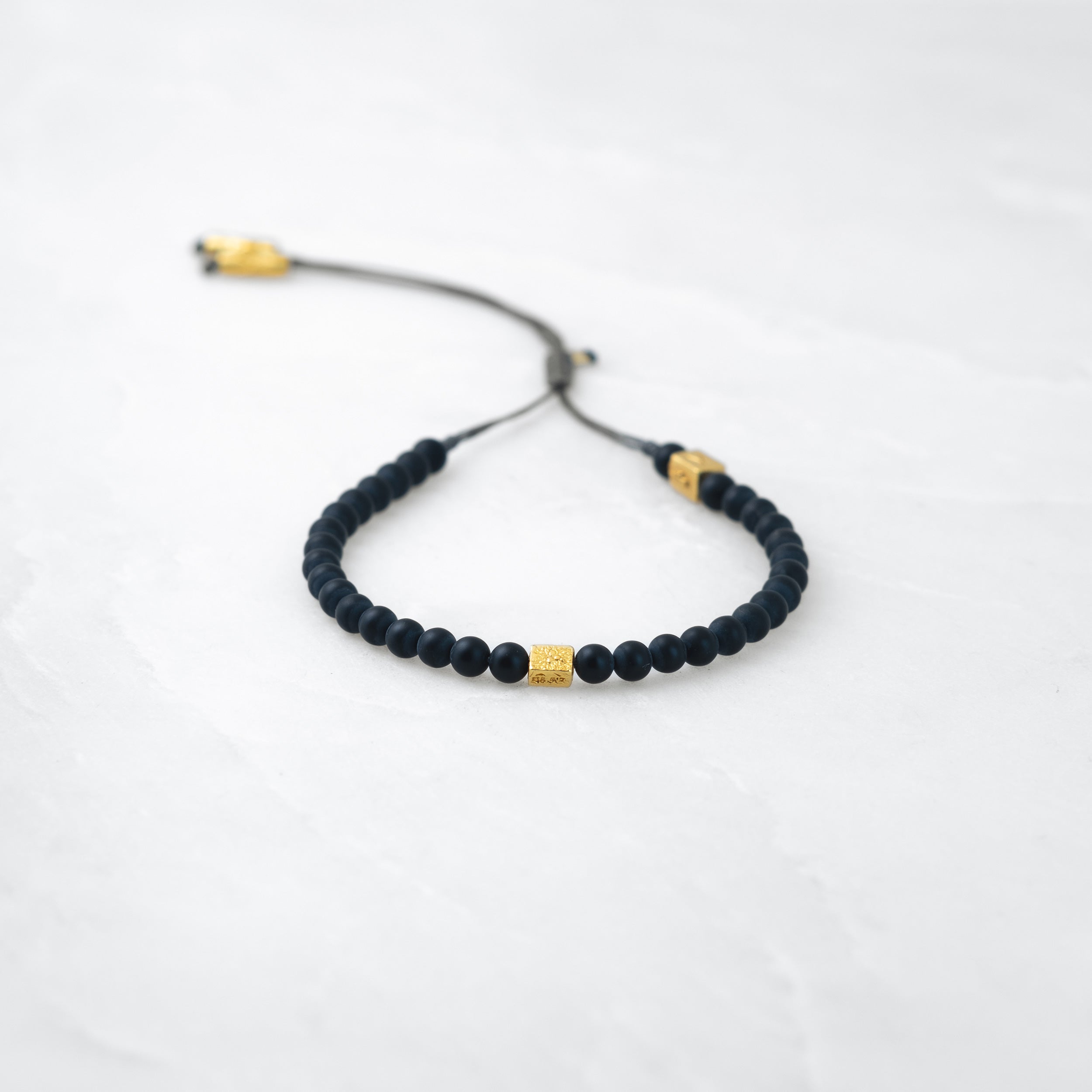 MALA bracelet - Basalt, golden Bodhi